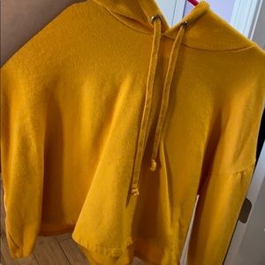 semi cropped yellow sweatshirt